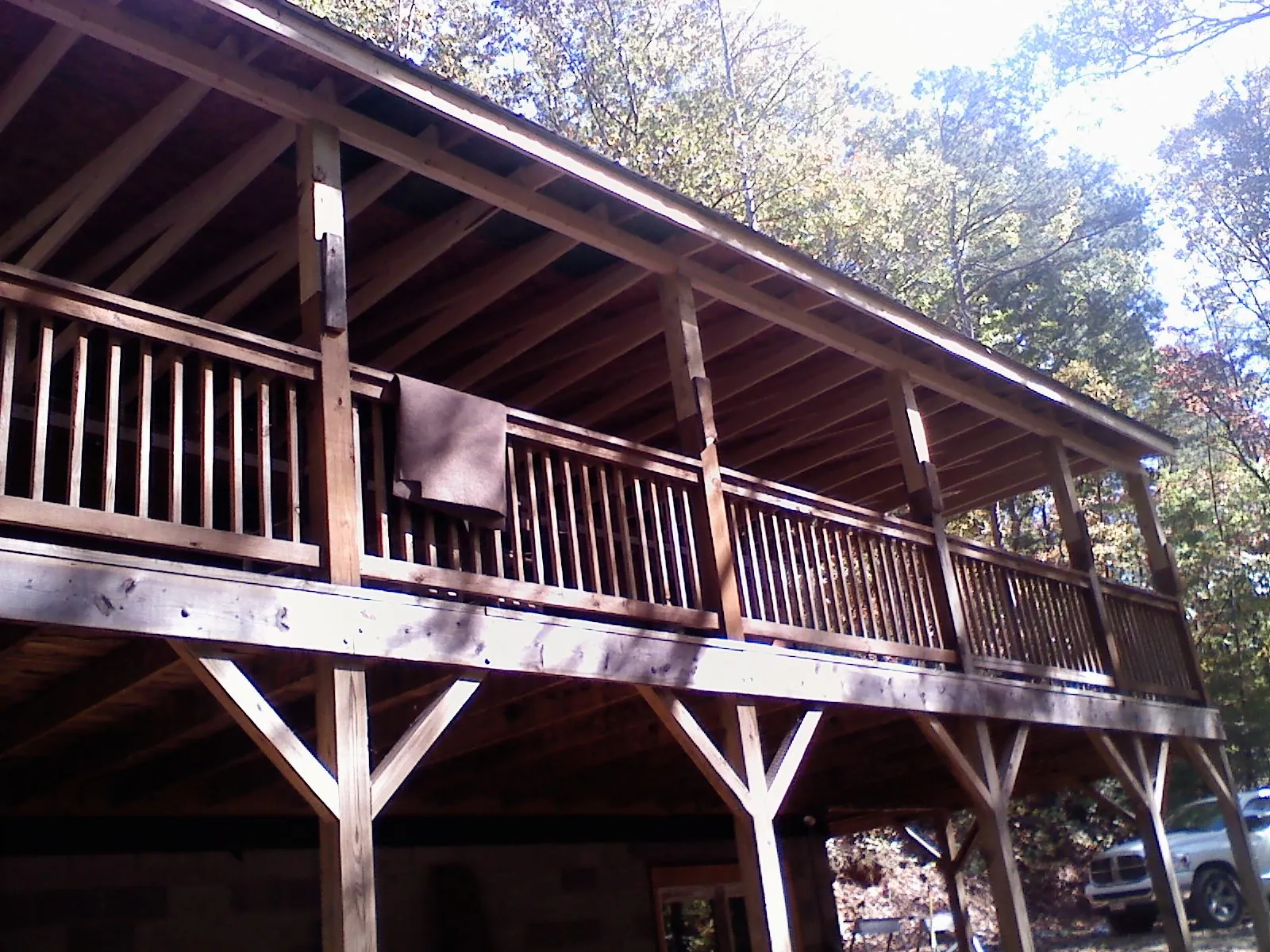 Timber framing under a new elevated porch and deck — Roof Leak Repair in Ethelsville by Roofing Brothers